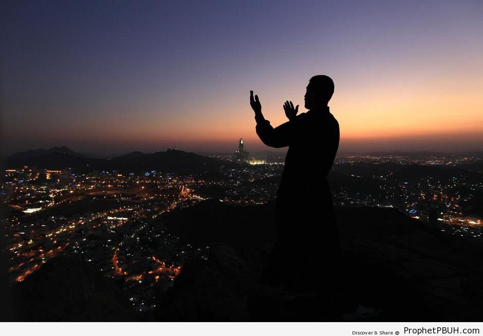 Man Prays at the Top of Noor Mountain in Makkah, Saudi Arabia - Makkah (Mecca), Saudi Arabia -